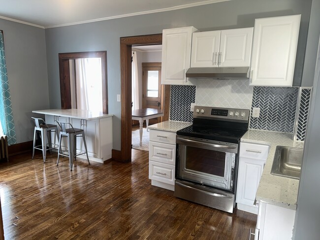 Brand new kitchen with eat in seating - 380 Main St Unit Beautiful main apartment