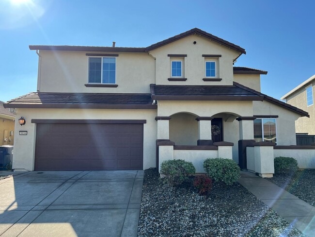 Building Photo - Beautiful 4 Bedroom Solar Home With Low Maintenance Landscaping And Updated Interior