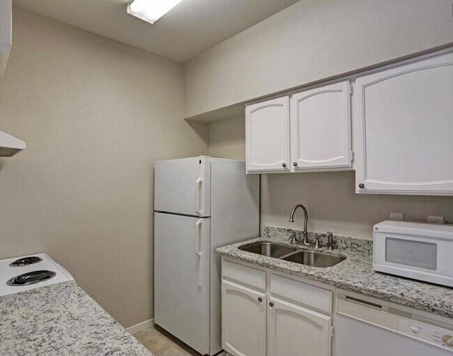 Photo - Prime Location in West University Area! First floor unit with open floor plan, tile floors throug...