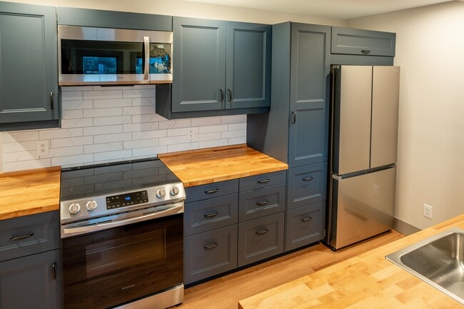 New induction stove and fridge - 622 Cedar St