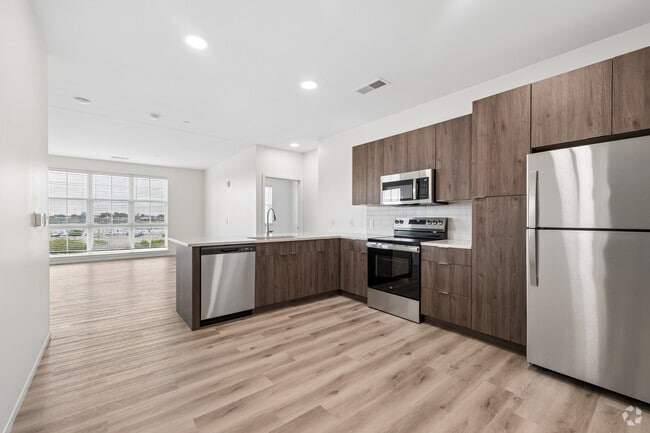2BR, 2BA - 1,358SF - Kitchen and Living Room