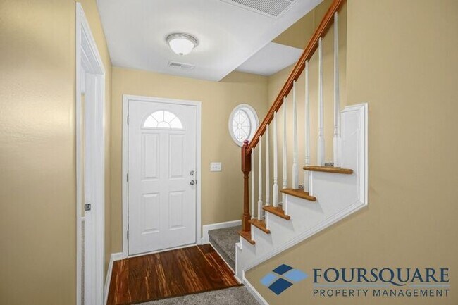 Photo - Charming 3-Bedroom Townhome with First-Floor Suite & Off-Street Parking – Near Capital Blvd & I-440