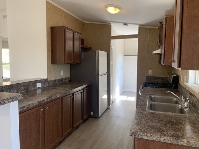 Photo - Enjoy country living with views in this 3-bedroom, 2-bath home.