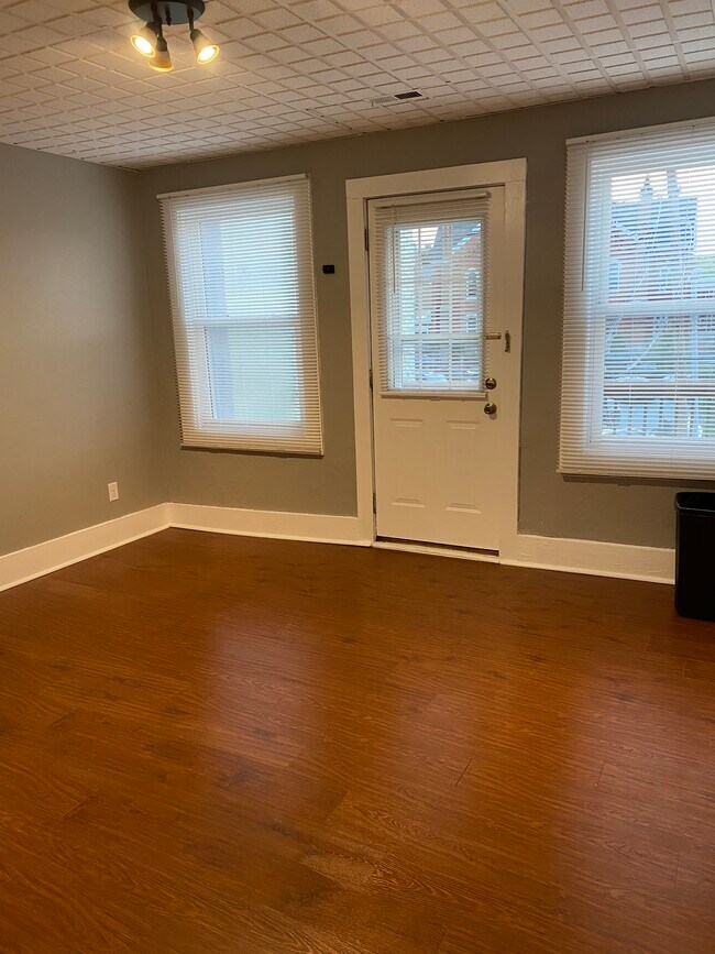 Living room and access to deck - 919 Massachusetts St Unit D