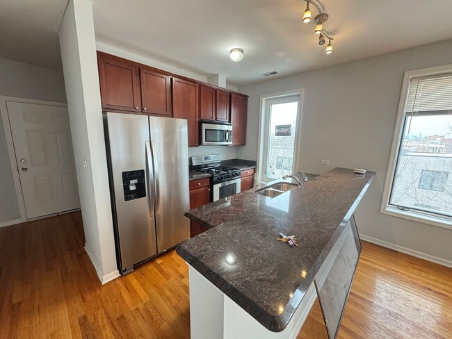Photo - Bright & Spacious 2 Bed / 2 Bath Condo with Hardwood Floors, Granite Kitchen & Walk-In Closets