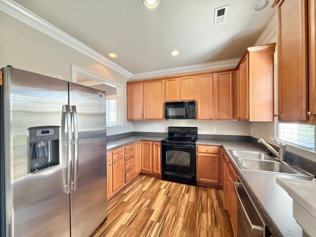 Photo - **OFFERING REFUNDABLE APPLICATION FEES** Modern 2BD, 2.5BA Raleigh Home Located in Brier Creek Ne...