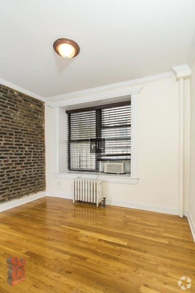 Building Photo - E 13TH ST. Rental