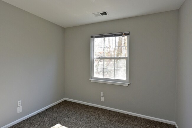 Cozy bedroom with carpet