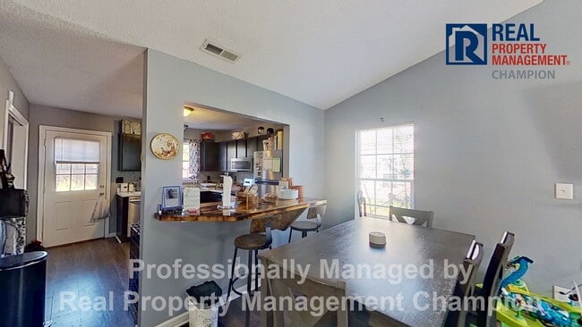 Photo - Charming 2BD/2 BA End Unit Townhouse w/Fireplace and Fenced Backyard