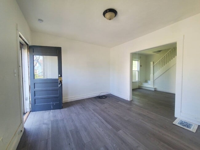 Building Photo - 7401/7311 Brinsmade Ave Unit Left-Side