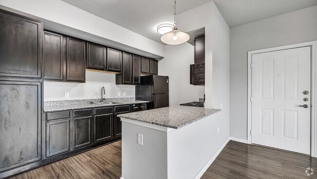 Spacious kitchen with modern inspired finishes - Sendero Ridge Rental