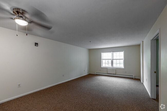 3BR, 2BA - Living Room - University Crossing Apartments