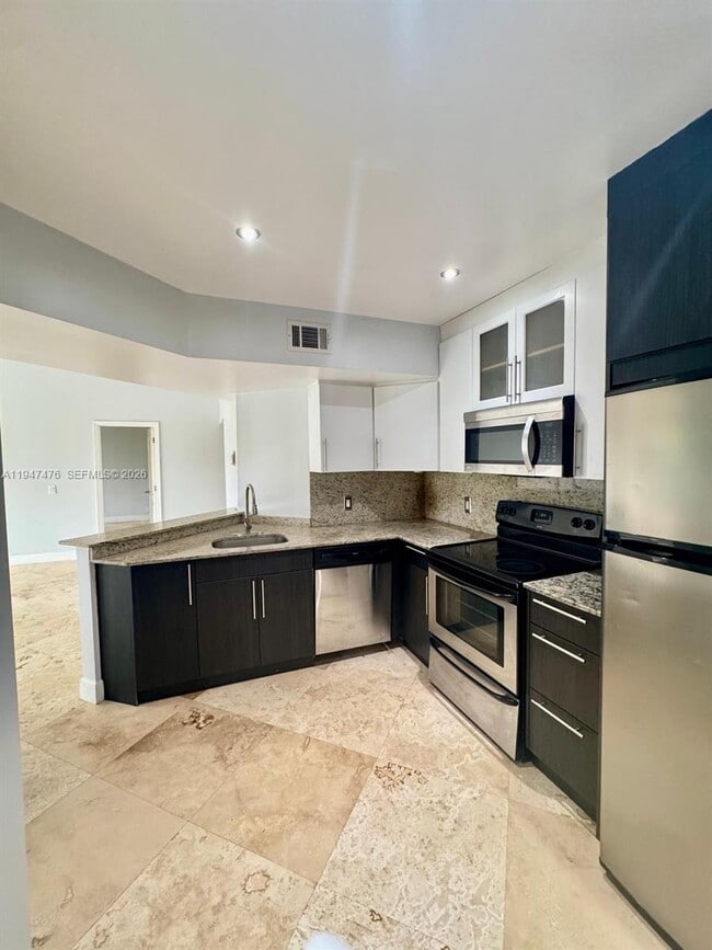 Photo - 8871 Wiles Rd Unit 306