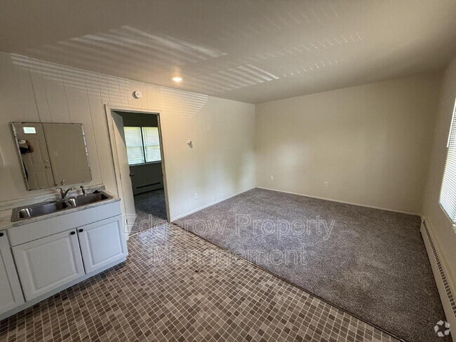 Building Photo - 13827 Ironwood Dr NW Unit Apt 7
