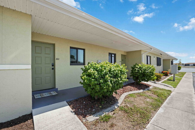 Building Photo - "Charming 2-Bed, 2-Bath Villa in Lake Shore Condominiums" Unit 801