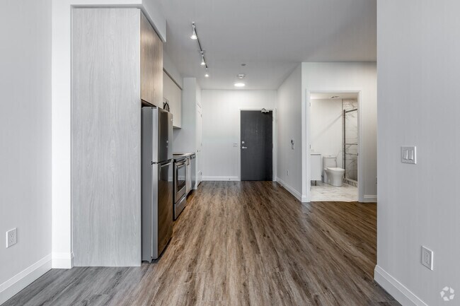 1BR + Den, 1BA - 561SF - Kitchen/Living Room - Bloom