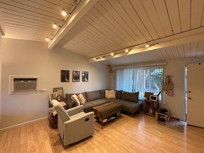 Unit 1 Living Room Looking Toward Large Window