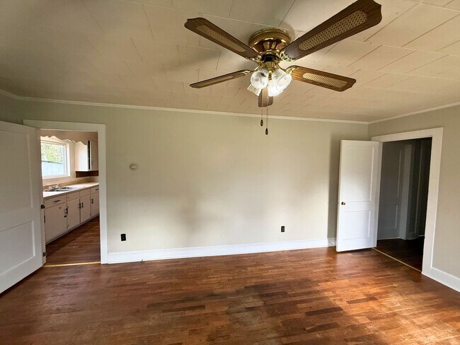 Photo - Spacious 2 Bed House | Private Patio + Sliding Door Dining Area