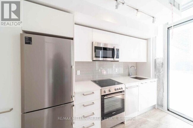 Photo - 28 Wellesley St E Unit 3001