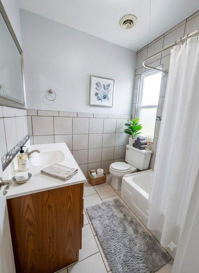 Photo - ? Steps from Brady St! Bright 2BR with FREE Laundry & Pet-Friendly Living Unit #4 Upper Rear