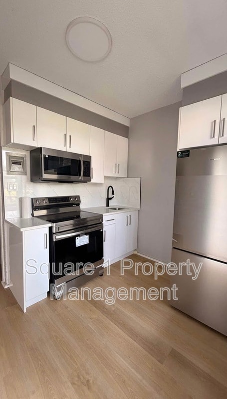 Building Photo - 7805 107 Unit 2