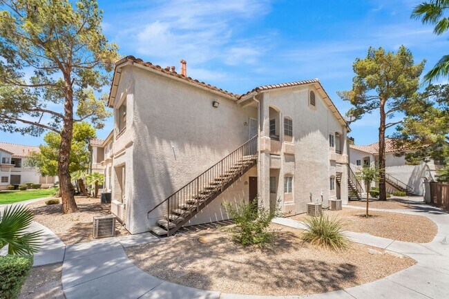 Photo - Modern Gated Condo with Stylish Upgrades, Poolside Location & Private Balcony!