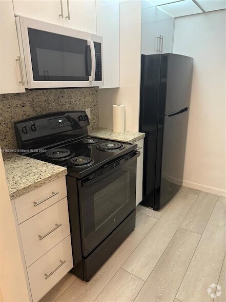 Building Photo - 251 SW 134th Way Unit 303M Rental