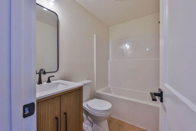 Photo - Modern Remodel with Designer Finishes | All Utilities Included Unit 10