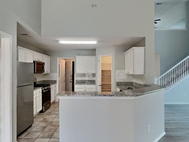 Photo - Beautiful 4BR Home in Denton with Fireplace, Fenced Yard & Garage