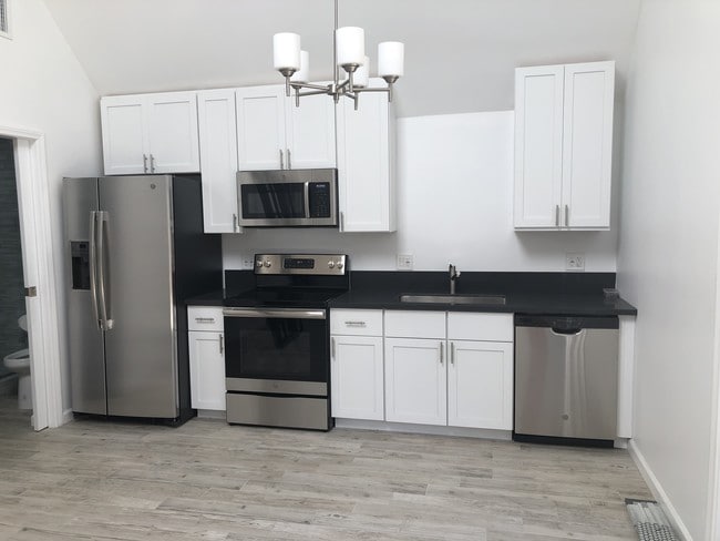 Stainless steel appliances/granite countertop - 8422 W 4th St Unit 8424 West 4th Street