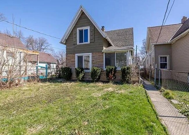 Photo - Newly Renovated 4BR/1BA Single-Family Home with Garage – Cleveland