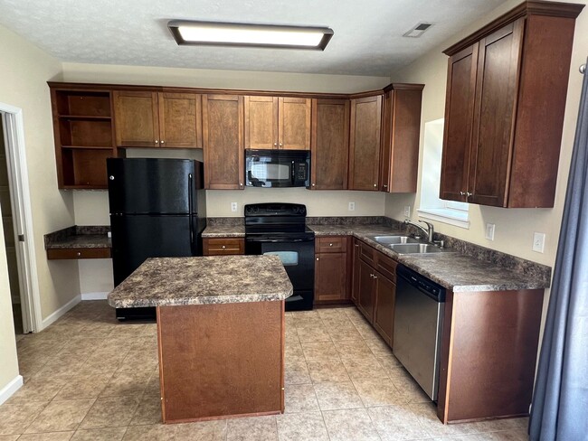 Photo - End Unit Towhouse with 2 Suites and Fenced...