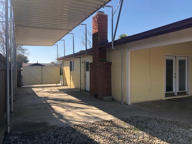 Photo - 3 bd, 2 ba, with in-ground pool & covered RV parking