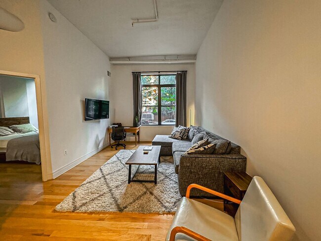 Photo - Luxurious 1 Bed 1 Bath Condo In Desired Courthouse Community - Water Included in Rent! Unit 106