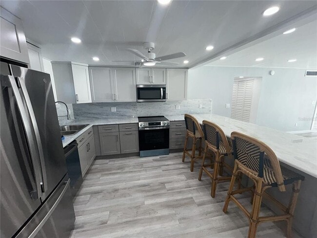 Photo - 7625 Sun Island Dr S Unit 108