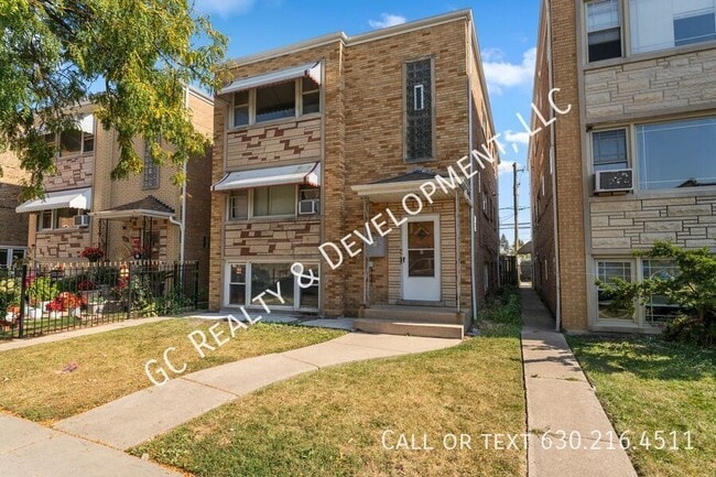 Building Photo - 2517 N Laramie Ave Unit 2 ,  2