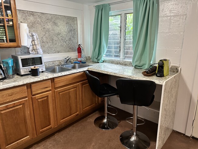 Garden views from the kitchen table. - 2854 Booth Rd Townhome