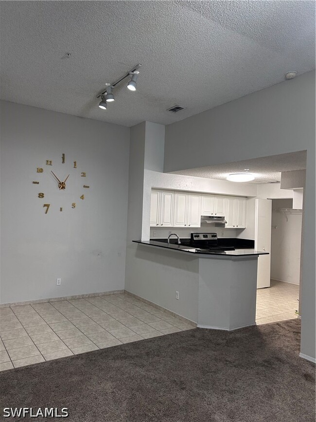 Building Photo - 8225 Ibis Club Dr Unit 216