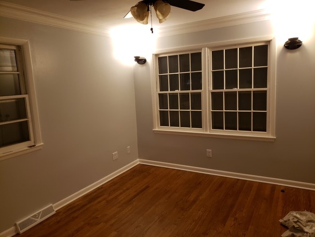 Master bedroom with hardwd, sconces - 6452 Washington Ave Unit 6452