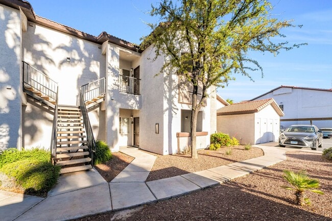 Building Photo - Modern Gated Condo with Upgraded Interior and Attached Garage in Prime South Las Vegas Location!