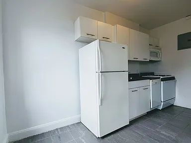 Photo - "Charming 1-Bed Oasis in the Heart of Woodside, NY!"