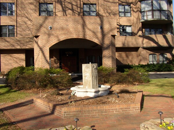Fountain off the main entrance - The Carlton Condominiums