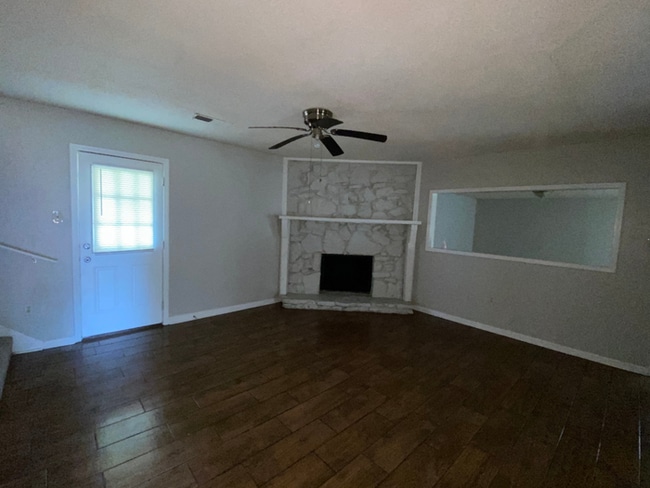 4BR/2BA Millington Rental with Hardwood Flooring, Rustic Fireplace & Large Yard