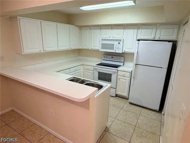 Building Photo - 4121 Residence Drive Unit 305
