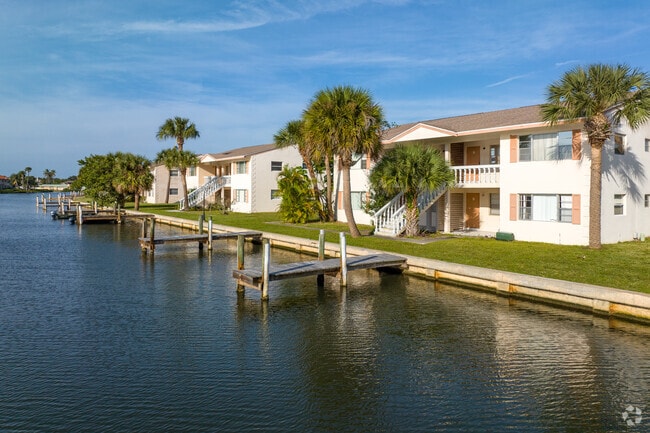 Stroll along the docks on the canal - The Pines Resort and Apartments