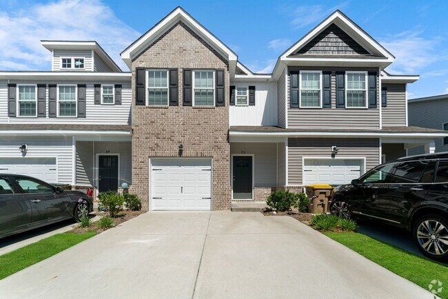 Building Photo - Stunning Townhome Available Now!