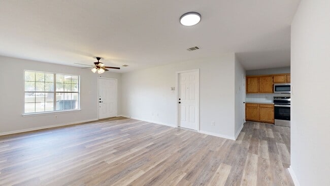 Photo - NEW STAINLESS STEEL APPLIANCES + NEW LUXURY VYNIL PLANK THOUGHOUT!!