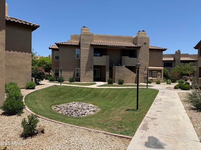 Building Photo - 9451 E Becker Ln Unit 2020 Rental