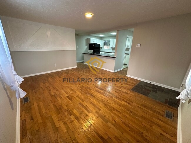 Photo - Spacious 4 Bedroom Home Featuring Open Layout & Hardwood Floors Available NOW!