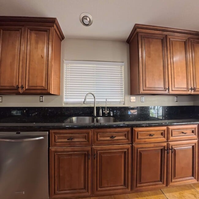 Photo - Stunning 2-Story Home with a Bedroom downstairs and a Backyard Oasis.